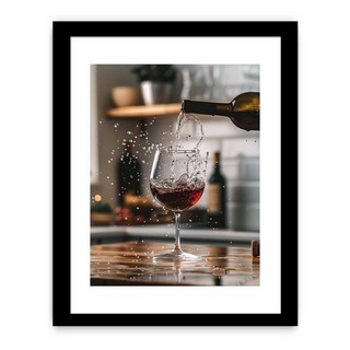Framed picture of red wine being poured into a glass with a blurred background